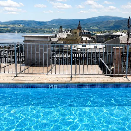 Atico Centrico Con Piscina Comunitaria 아파트 리바데오