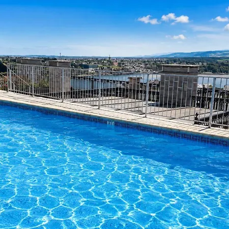 アパート Atico Centrico Con Piscina Comunitaria リバデオ